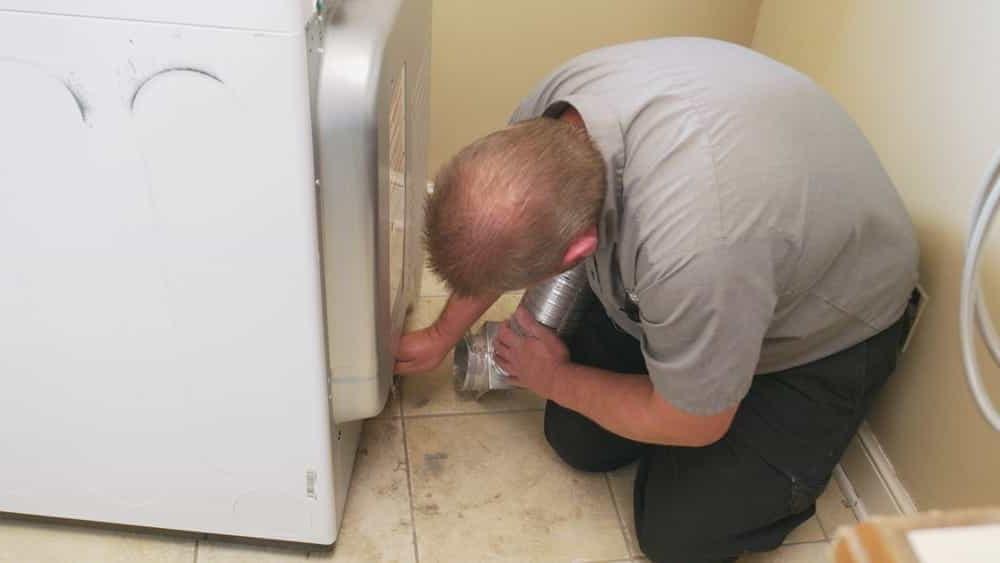 removing clog from dryer vent pipe